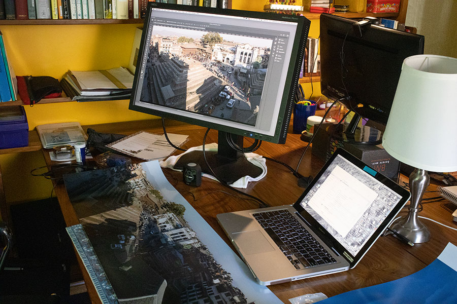 Photo of Desktop With Printed Photo and the Same Photo on the Big Monitor